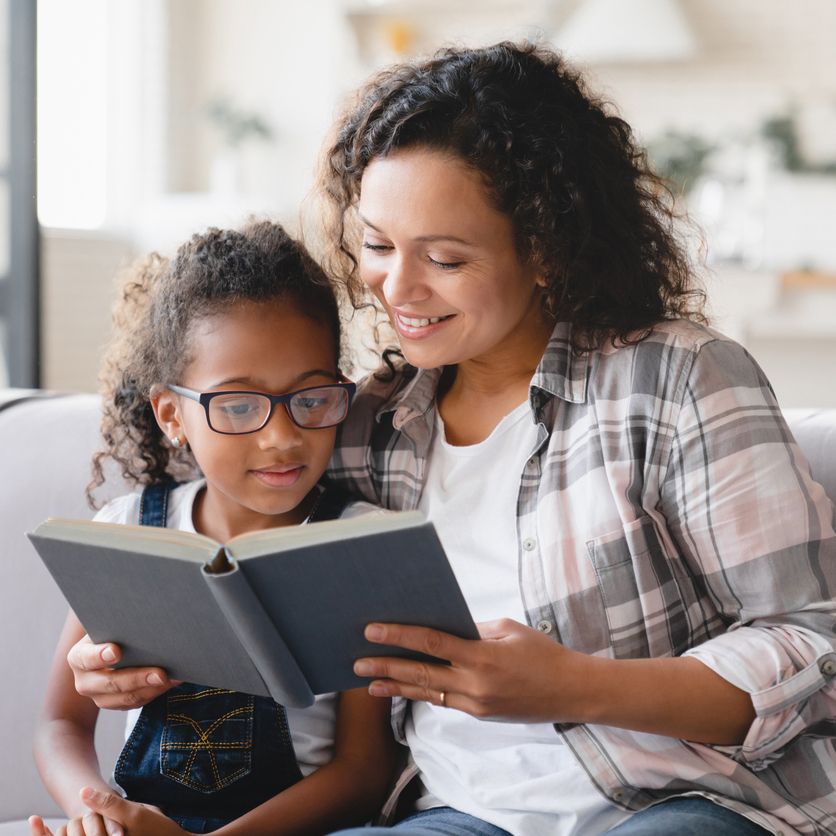 Adult reading to child